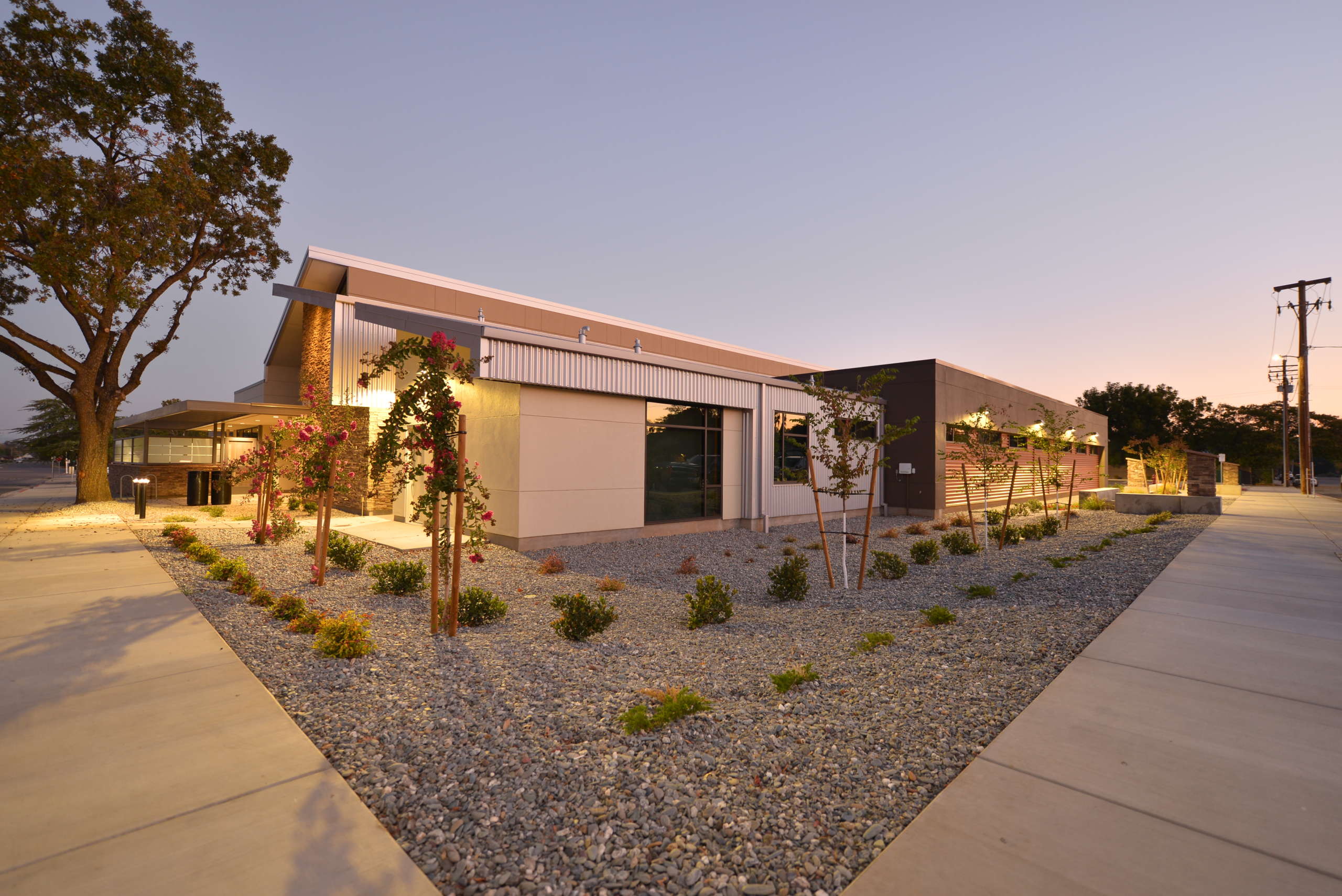 Side view of the Anderson Family Health & Dental Center at the Shasta Community Health Center at sunset